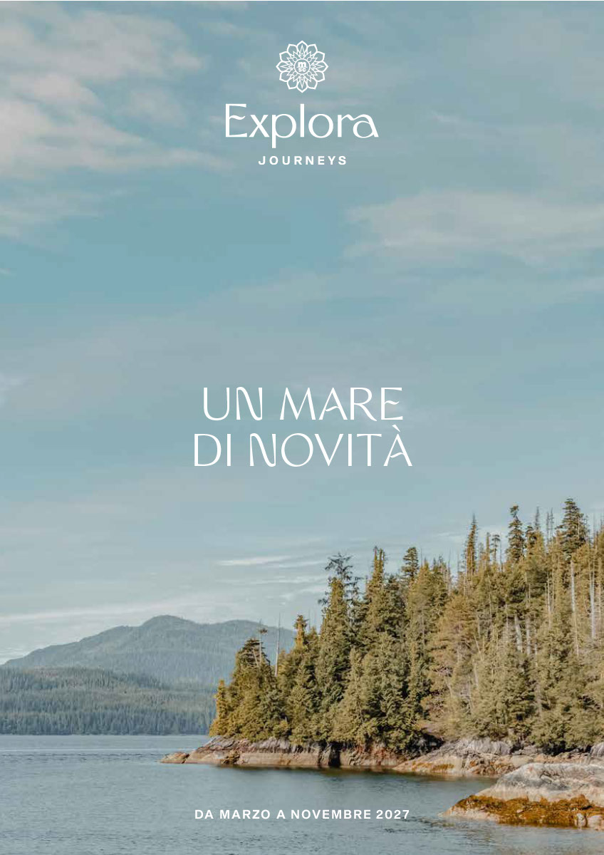 Copertina della brochure Explora Journeys marzo–novembre 2027, con paesaggio costiero e foreste.